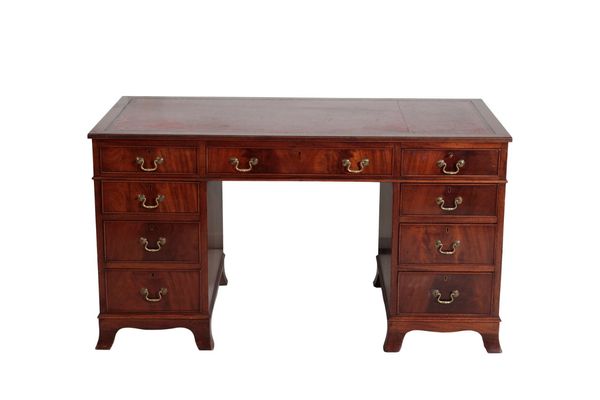 A MAHOGANY PEDESTAL DESK IN GEORGE III STYLE,