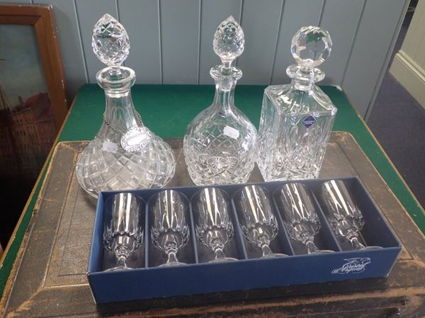 THREE CRYSTAL DECANTERS