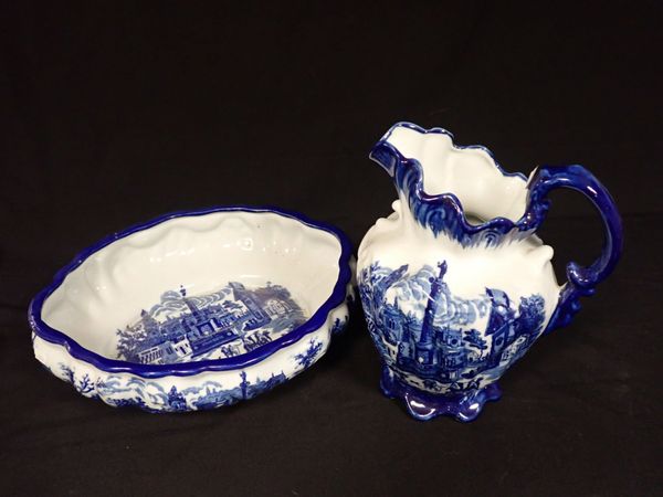 A MODERN BLUE AND WHITE POTTERY WASH JUG AND BASIN