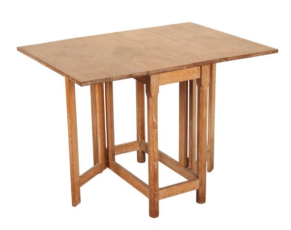 A LIMED OAK GATELEG TABLE, IN THE COTSWOLD STYLE