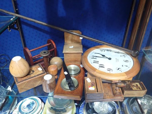 A PINE CASED CLOCK