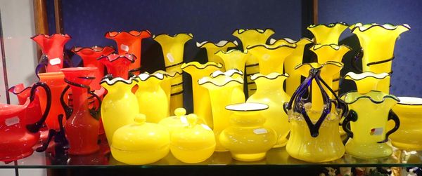 A COLLECTION OF  YELLOW AND RED GLASS VASES