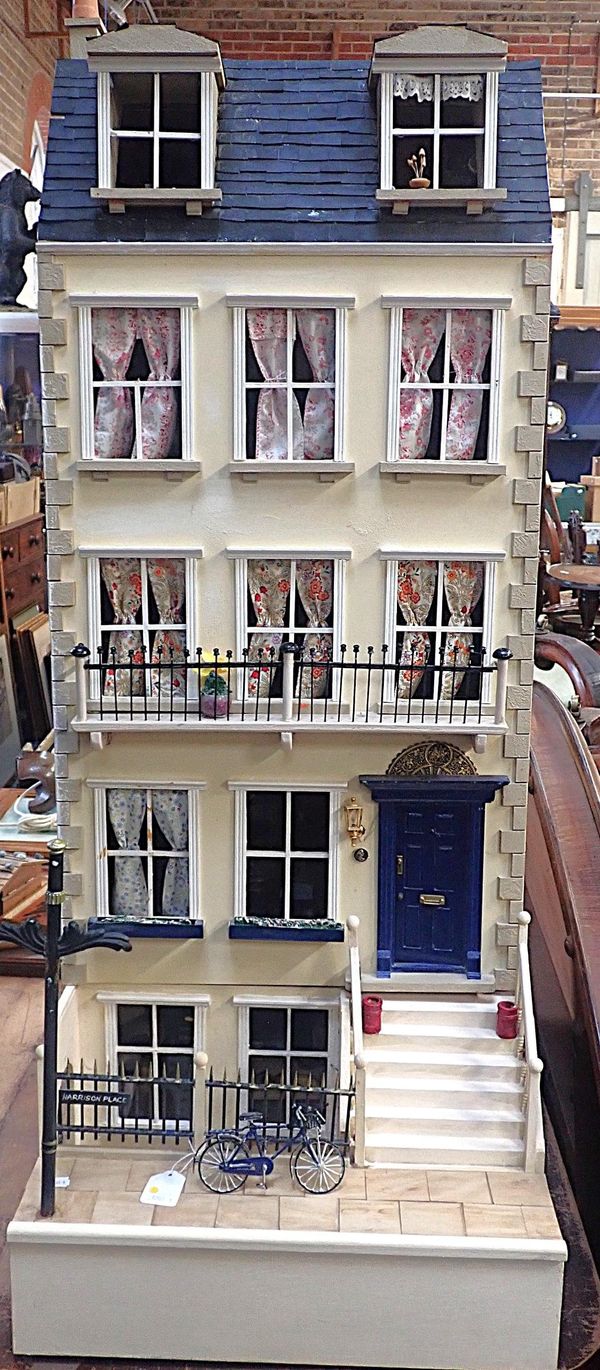 A SCRATCH-BUILT DOLL'S TOWN HOUSE