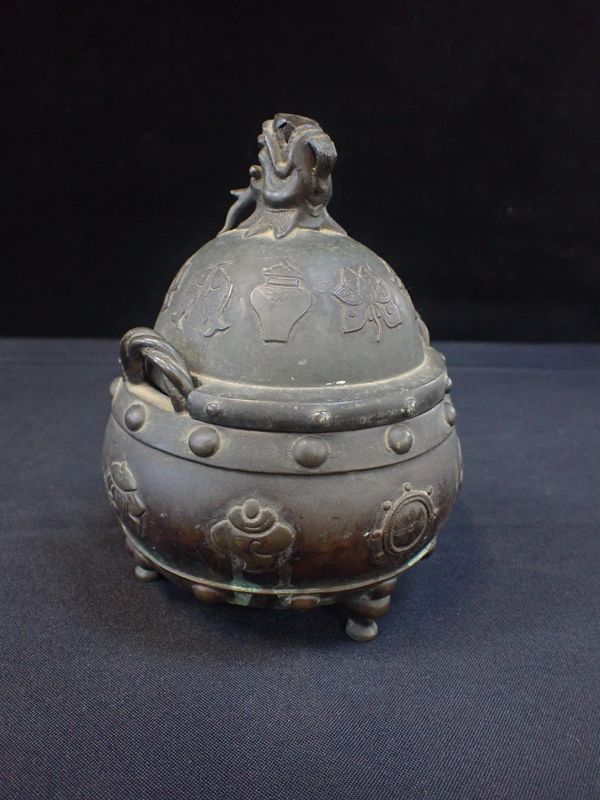 A FAR EASTERN BRONZE INCENSE BURNER