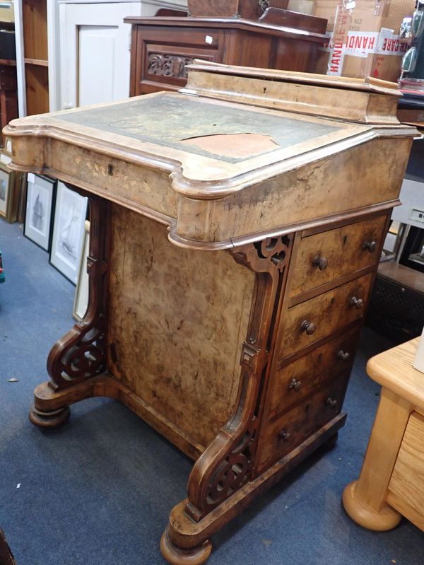 A VICTORIAN WALNUT DAVENPORT