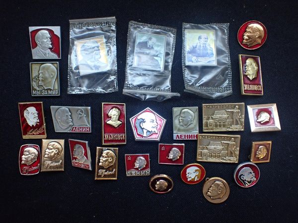 A COLLECTION OF SOVIET ERA STYLE BADGES