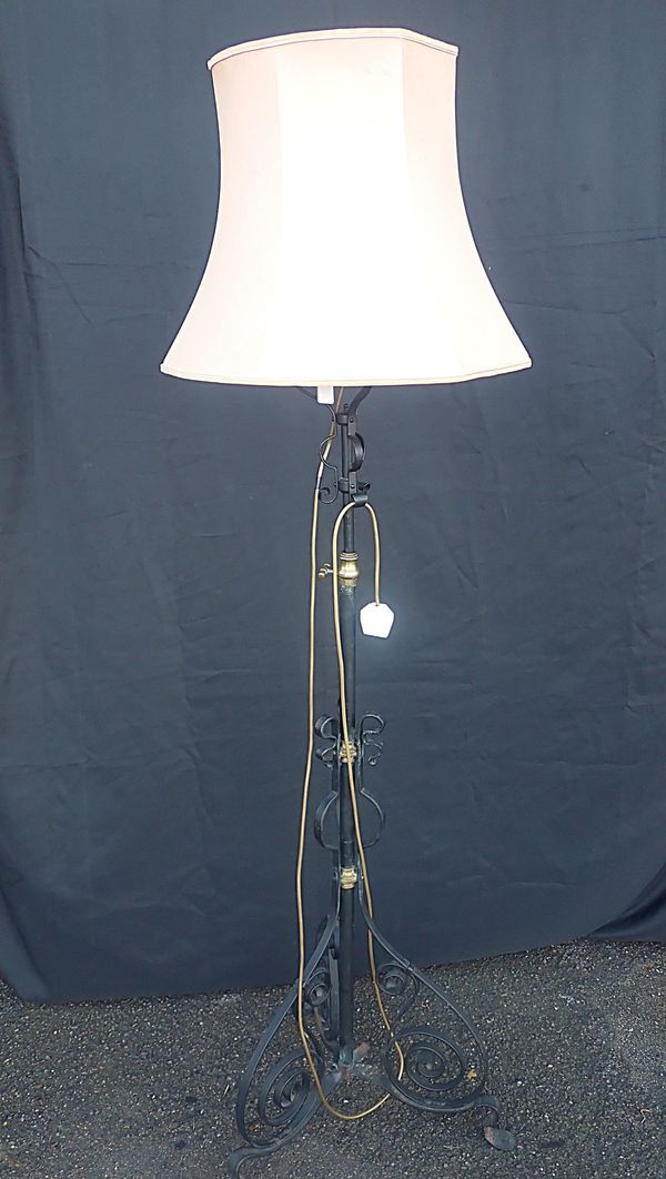 A VICTORIAN IRON AND BRASS STANDARD LAMP