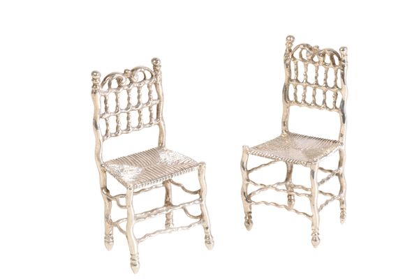 A PAIR OF DUTCH SILVER MINIATURE CHAIRS