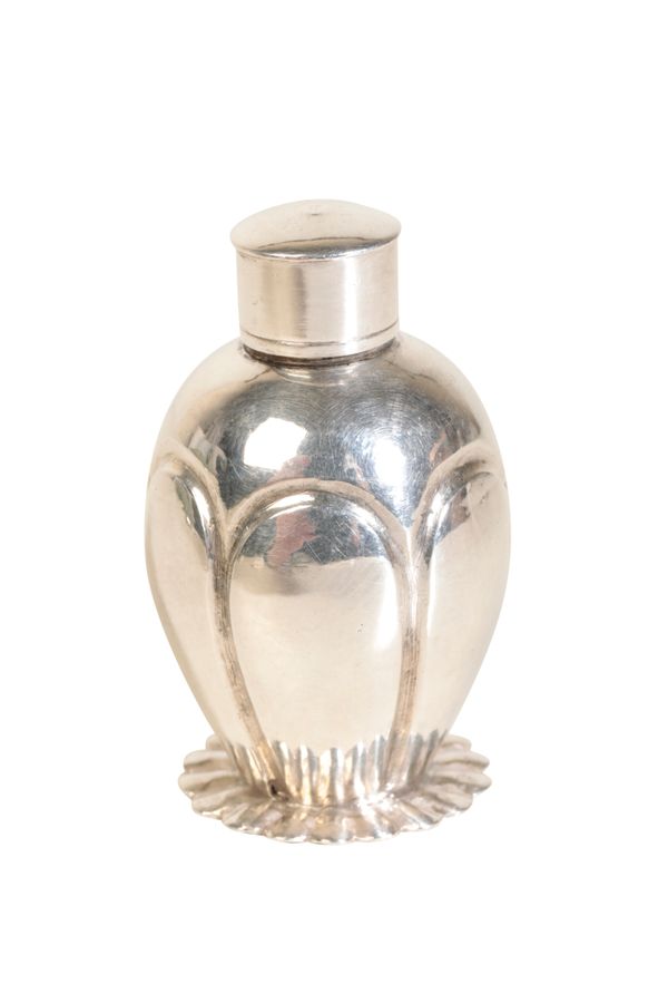 A DUTCH SILVER MINIATURE TOBACCO JAR AND COVER