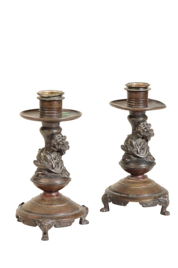 A PAIR OF FRENCH BRONZE CANDLESTICKS