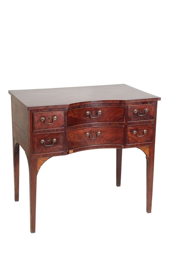 A MAHOGANY CONCAVE FRONT SIDE OR DRESSING TABLE,