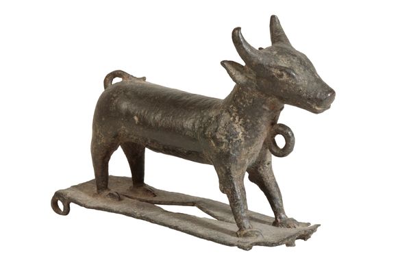 A BRONZE MODEL OF A BULL,