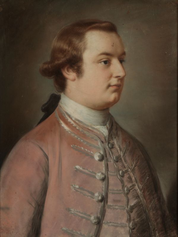 CIRLE OF WILLIAM HOARE R.A. (1707-1792) A portrait of a young gentleman wearing a pink coat trimmed with silver braid