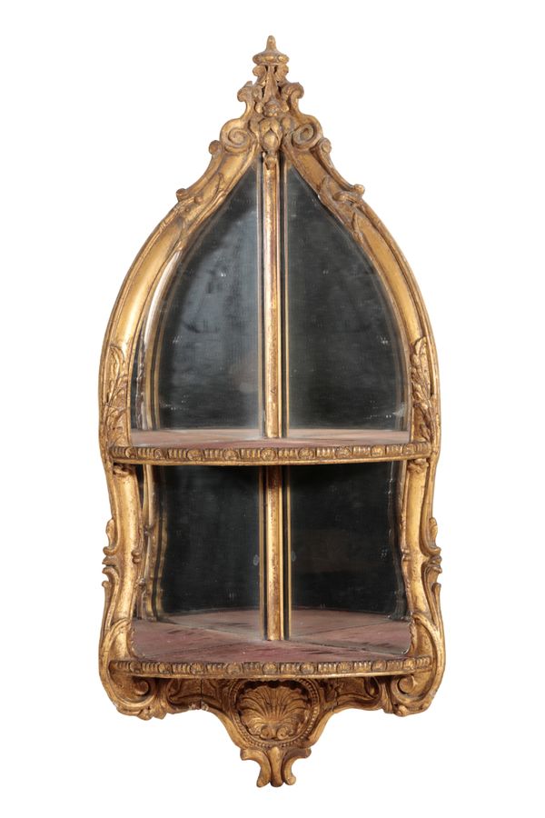 A SET OF EARLY VICTORIAN GILT COMPOSITION AND MIRROR BACKED CORNER WALL SHELVES IN ROCOCO TASTE,