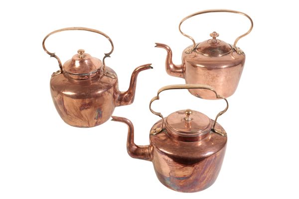 THREE ENGLISH COPPER KETTLES,