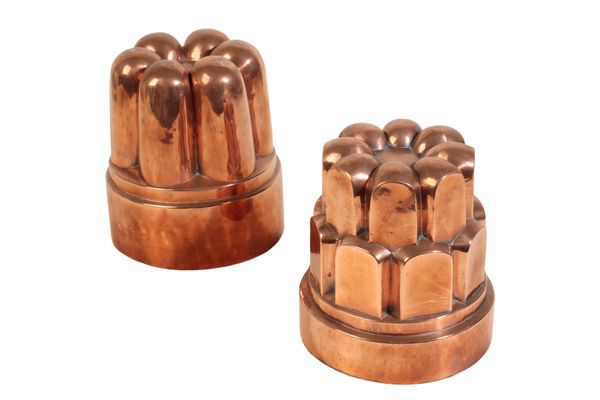 TWO LARGE VICTORIAN CASTELLATED COPPER 'JELLY' MOULDS,