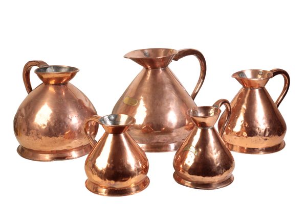 AN ASSOCIATED GROUP OF FIVE VICTORIAN COPPER 'HAYSTACK' WINE MEASURES,