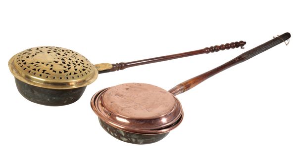 A GEORGE III BRASS AND COPPER WARMING PAN,