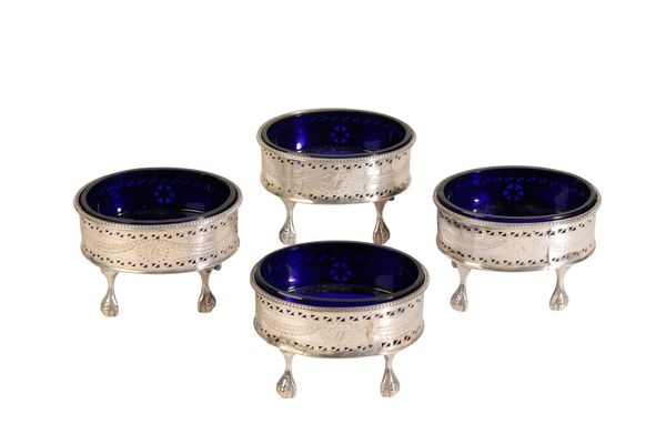 A SET OF FOUR GEORGE III SILVER COLURED METAL SALTS