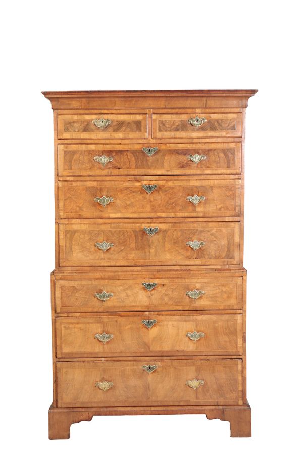 A GEORGE II WALNUT AND FEATHER BANDED CHEST ON CHEST,