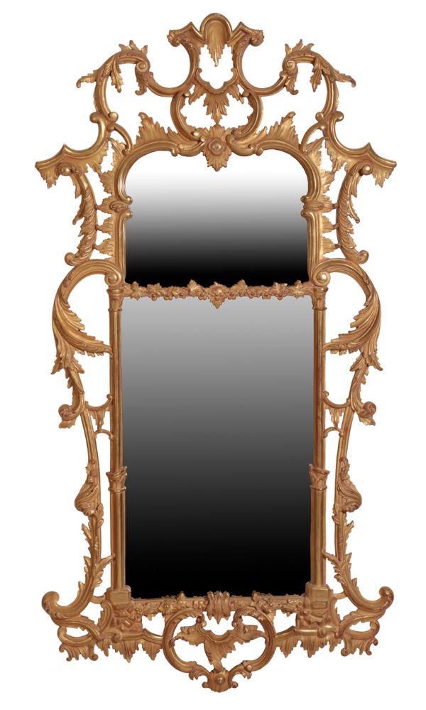 A PAIR OF LARGE CARVED AND GILTWOOD FRAMED WALL MIRRORS, IN ROCOCO TASTE,