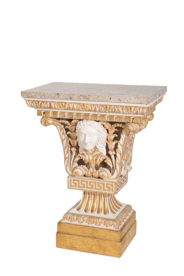 A PAIR OF CARVED, PAINTED AND PARCEL GILTWOOD CONSOLE STANDS, IN THE MANNER OF WILLIAM KENT,