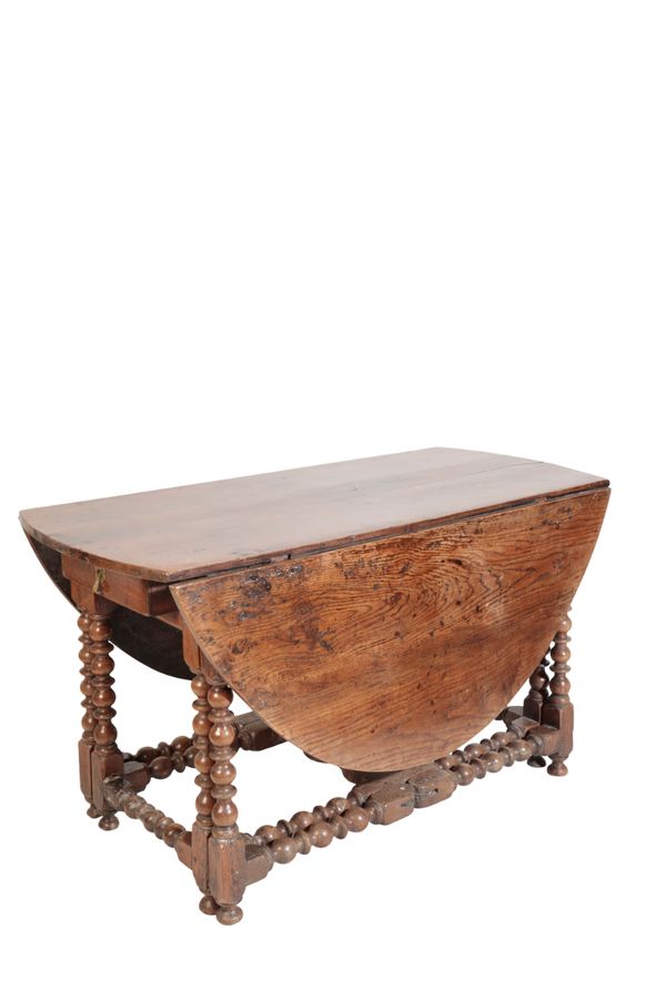 A CHARLES II OAK GATELEG TABLE,