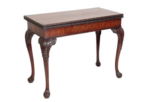 A GEORGE II CARVED MAHOGANY CARD TABLE,