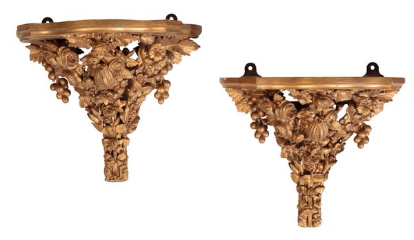 A PAIR OF GILTWOOD AND COMPOSITION WALL BRACKETS IN LOUIS XV TASTE,