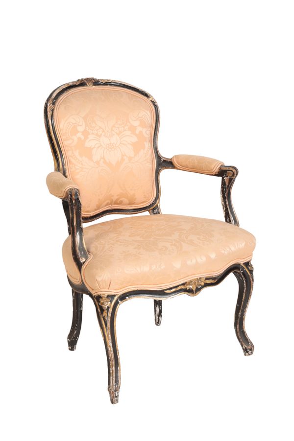 A LATE LOUIS XV CARVED AND PAINTED WOOD FAUTEUIL,