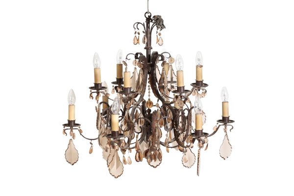 A WROUGHT IRON AND GLASS HUNG TWELVE LIGHT CHANDELIER,