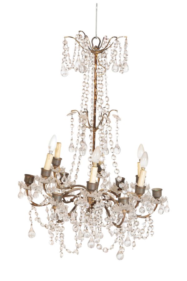 A GILT METAL AND GLASS HUNG TWELVE LIGHT CHANDELIER,