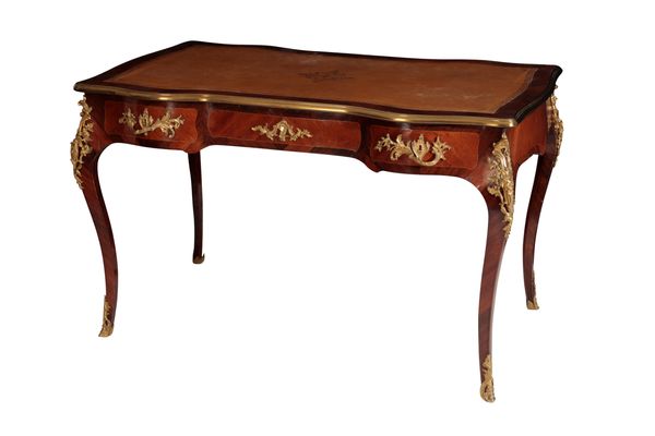 A KINGWOOD AND GILT BRONZE MOUNTED BUREAU PLAT, IN LOUIS XV STYLE,