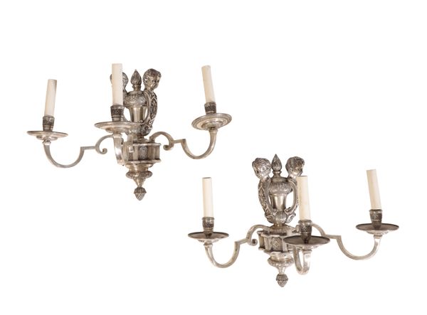 A PAIR OF EDWARDIAN SILVERED BRONZE THREE LIGHT WALL APPLIQUES, IN REGENCE STYLE,