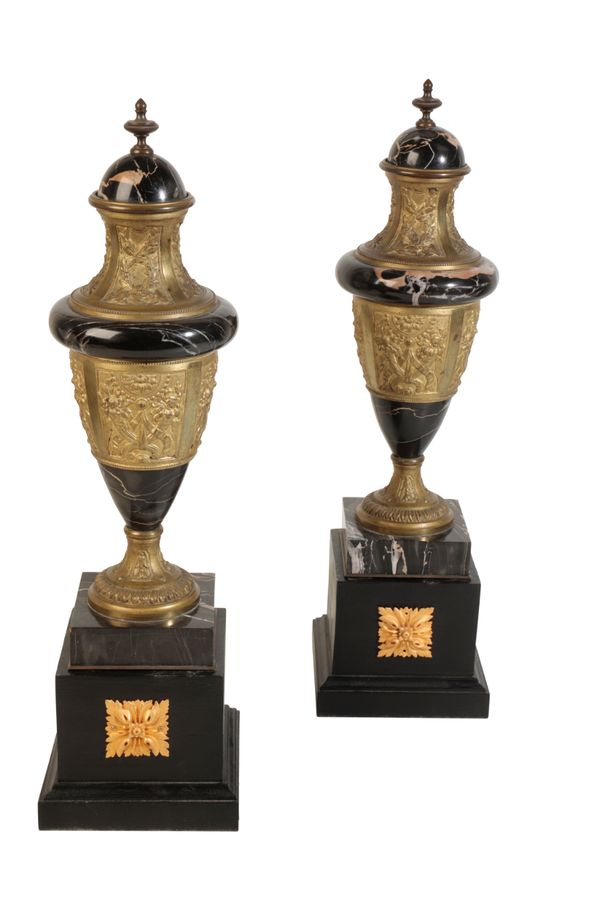 A PAIR OF CONTINENTAL MARBLE AND GILT METAL MOUNTED URNS, IN NEOCLASSICAL TASTE,