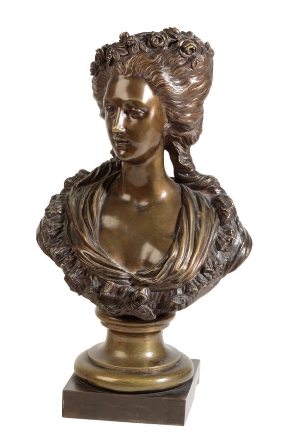 A FRENCH PATINATED BRONZE BUST OF A MAIDEN, IN 18TH CENTURY STYLE,