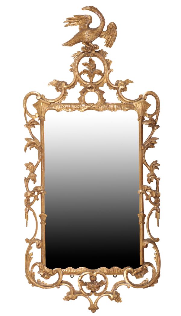 A GEORGE III CARVED AND GILTWOOD WALL MIRROR, IN ROCOCO STYLE,