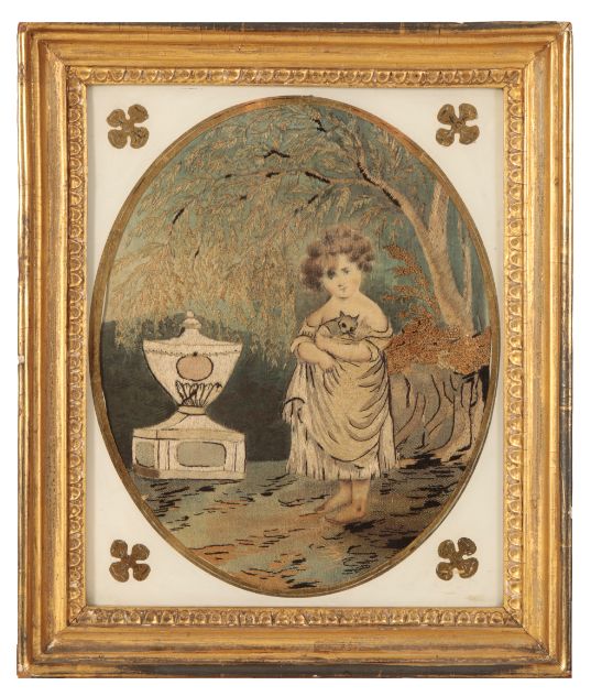 A GEORGE III SILKWORK PICTURE OF A GIRL BESIDE AN URN,