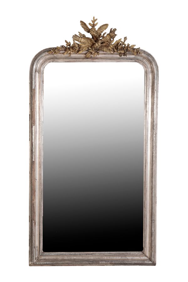 A CONTINENTAL SILVERED PINE AND COMPOSITION FRAMED PIER MIRROR,