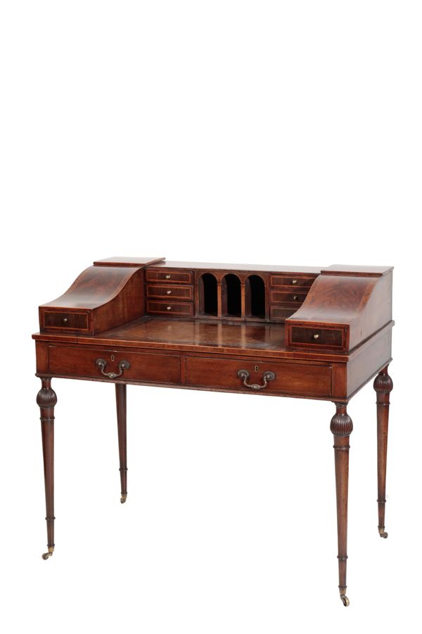 A MAHOGANY AND BURR WALNUT BANDED CARLTON HOUSE DESK, IN GEORGE III STYLE, BY GILLOWS,