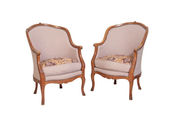 A PAIR OF CARVED BEECH AND UPHOLSTERED BERGÈRES, IN LOUIS XV STYLE,