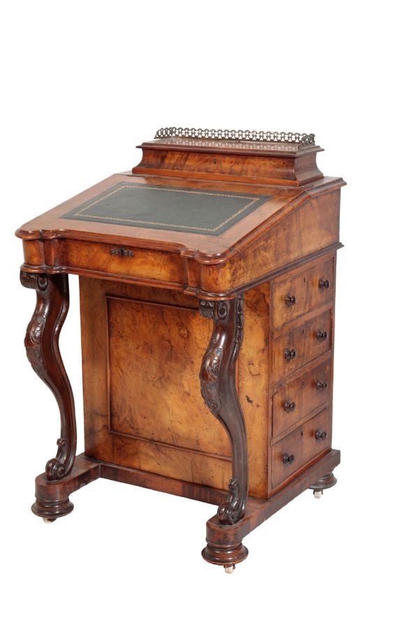 A VICTORIAN WALNUT DAVENPORT,