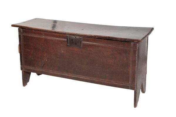 AN OAK COFFER,