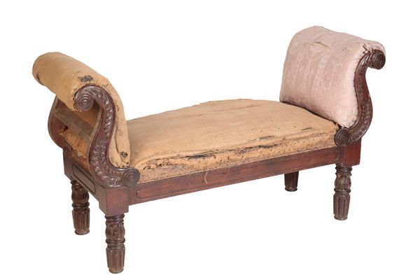 A REGENCY CARVED MAHOGANY AND UPHOLSTERED WINDOW SEAT,