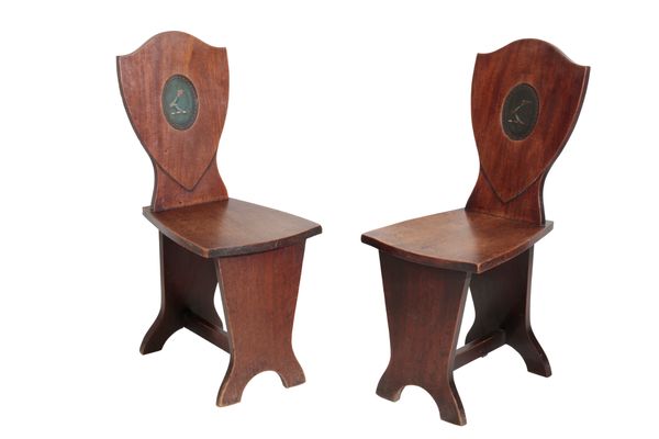 A PAIR OF GEORGE II MAHOGANY HALL CHAIRS, PROBABLY IRISH,