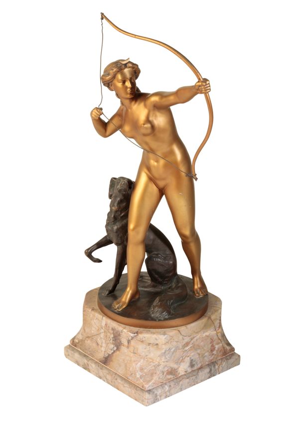 AFTER OTTO POERTZEL, (GERMAN 1876 – 1963), A GILT AND PATINATED BRONZE GROUP OF DIANA AND HER HOUND,