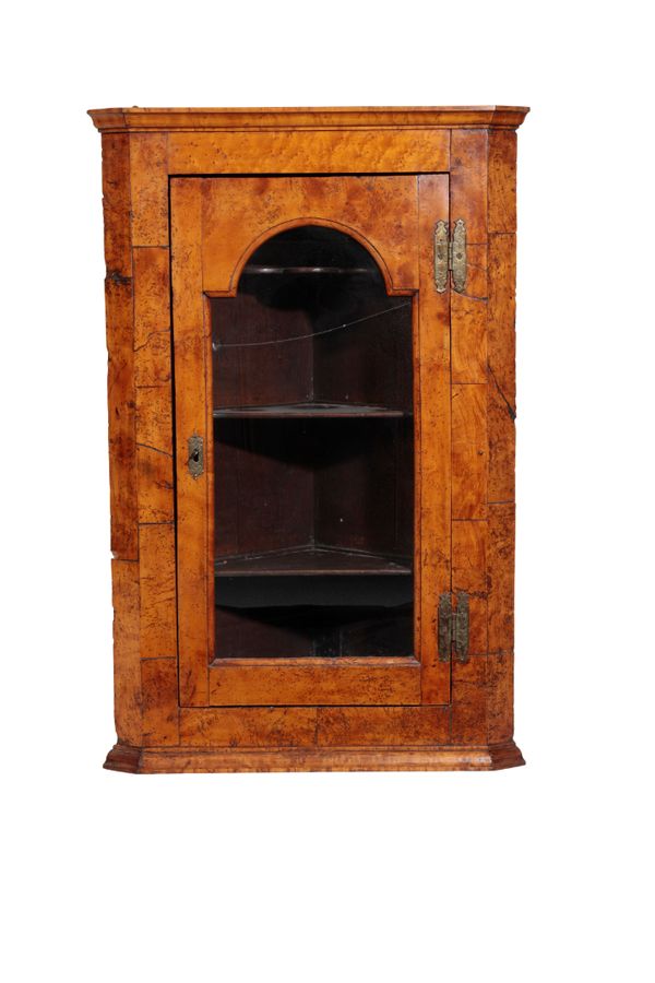 A GEORGE III BIRDSEYE MAPLE HANGING CORNER CABINET,