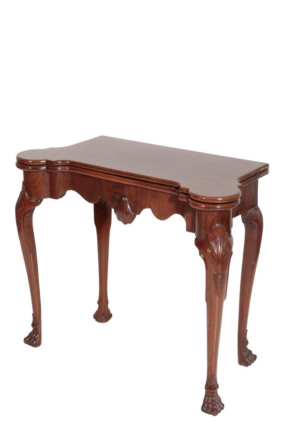 AN IRISH GEORGE II MAHOGANY CARD TABLE,