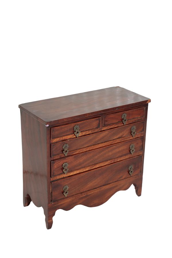 A MINIATURE MAHOGANY CHEST OF DRAWERS, IN LATE GEORGE III STYLE,