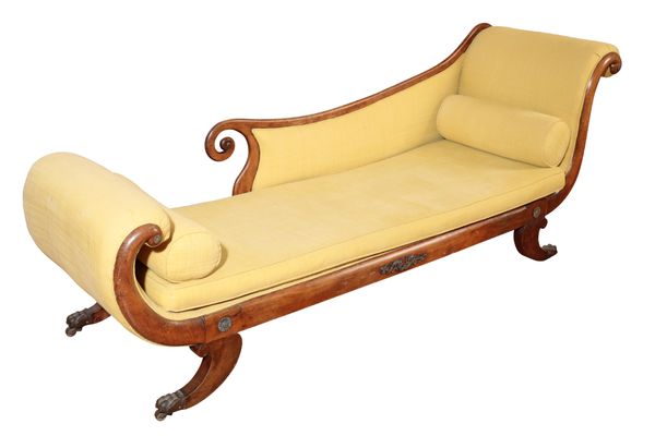 AN EMPIRE UPHOLSTERED AND STAINED HARDWOOD CHAISE LONGUE,